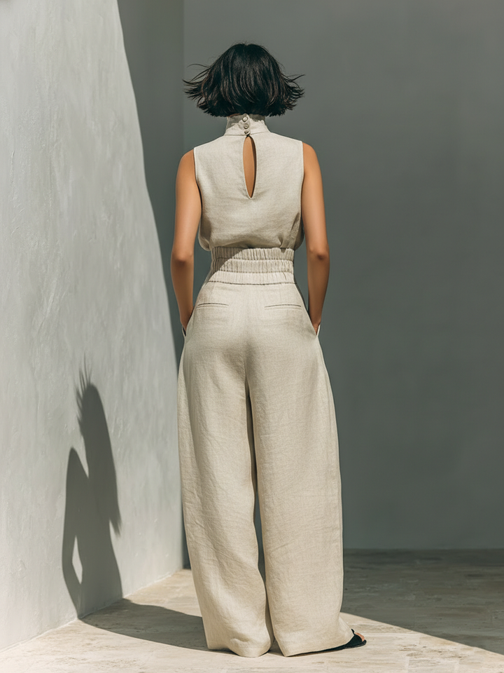 Women's minimalist set in cotton and linen with sleeveless blouse and wide-leg trousers